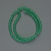 Perlen aus künstlicher Jade – glatte Kugeln, Durchmesser ca. 6 mm, Länge ca. 38 cm, auf Faden