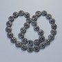 Hämatit-Perlen, mattschwarz, Durchmesser 12×4,5 mm, Länge ca. 41 cm, auf Schnur