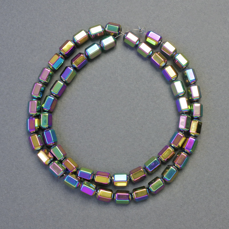 Hämatit-Perlen sechseckig, multicolor, Durchmesser 5×8 mm, Länge ca. 42 cm – Strang