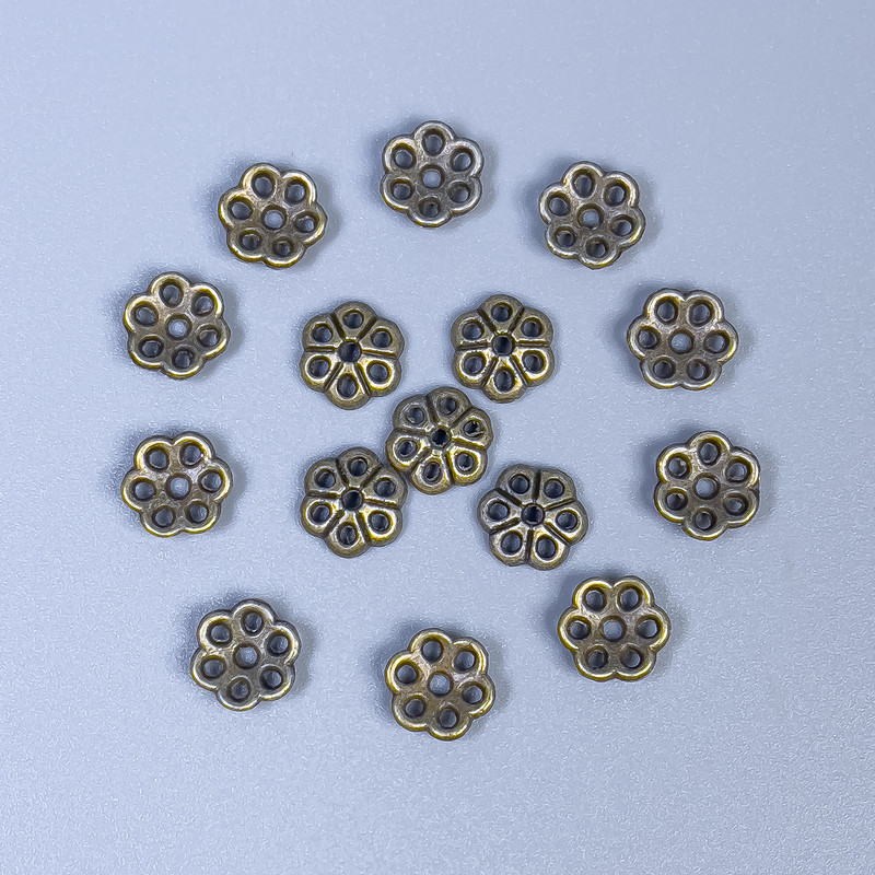 Perlenkappe bronzefarben, Durchmesser ca. 6×1 mm, Lochdurchmesser ca. 0,5 mm, Verpackung 80 Stück