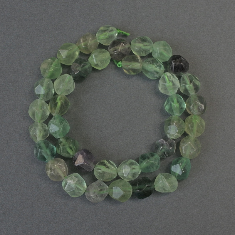 Fluorit-Perlen, facettiert 10×8 mm, auf Schnur