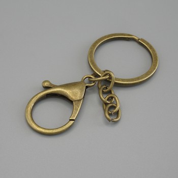 Basis für Schlüsselanhänger mit zwei Befestigungen 33×24 mm ± und Ring, Durchmesser 3 cm, Länge 7 cm