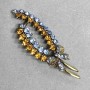 Brosche Zweig mit gelben und blauen Strasssteinen aus silberfarbenem Metall 64×23 mm +