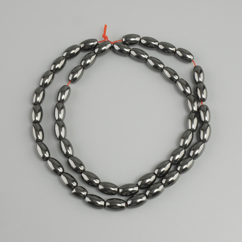 Hämatit-Perlen, Kornform, Durchmesser 8×5 mm, Länge ca. 40 cm, auf Nylonfaden