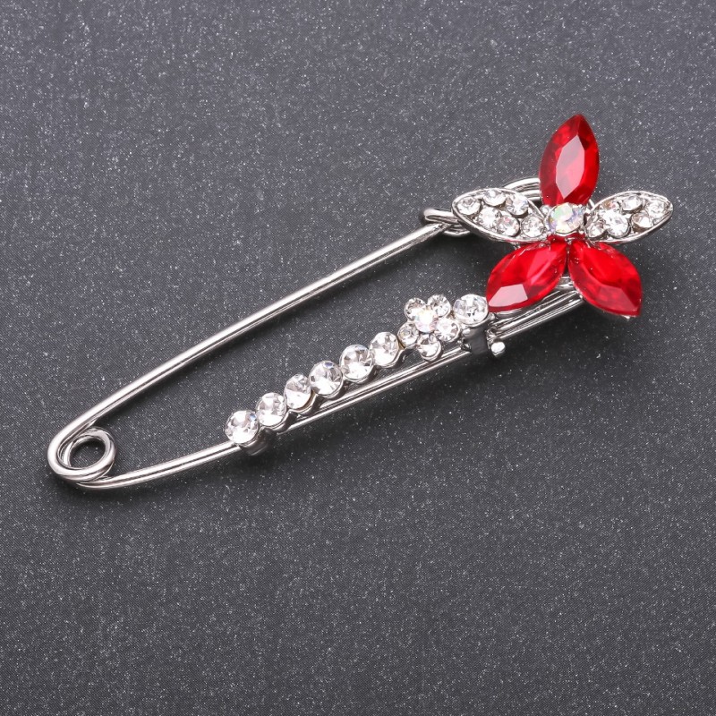 Nadelbrosche mit roten Glaskristallen 68×23 mm aus weißem Metall