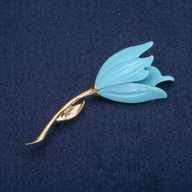 Blumenbrosche mit blauem Emaille, goldfarbenes Metall 30 × 72 mm