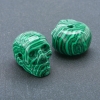 Schädelperle aus Malachit (gepresst) 25×19 mm +