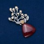 Brosche mit Karneol, 74×32 mm, mit einer Perle, silberfarbenes Metall mit goldfarbenem Überzug