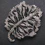 Brosche Blatt in dunklen Strasssteinen, Metallfarbe 'dunkles Silber' 58 × 72 mm