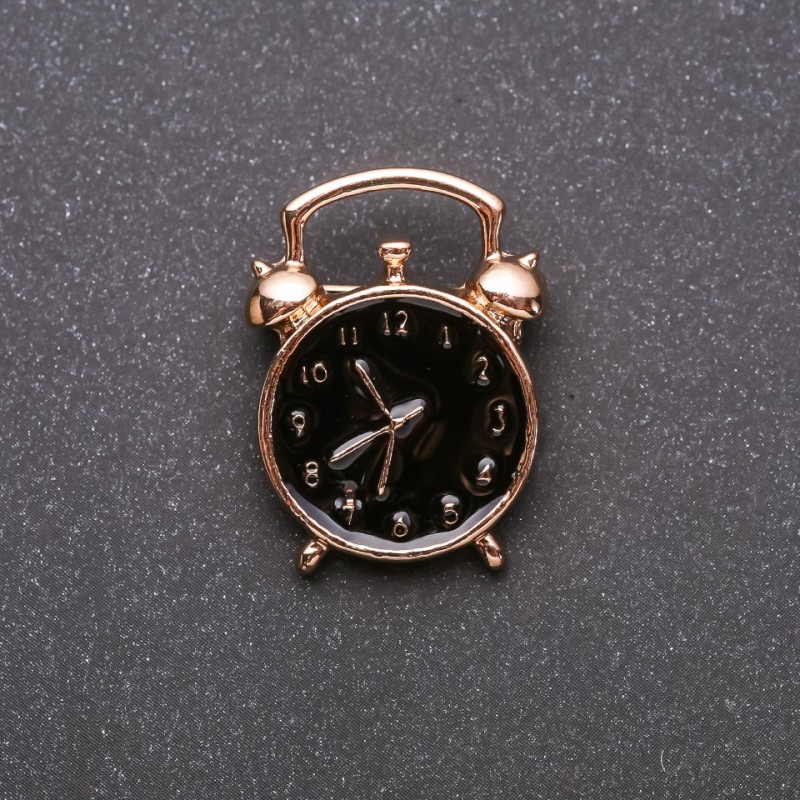 Brosche 'Uhrwecker' – Schwarze Emaille, Gelbes Metall, 20 × 27 mm